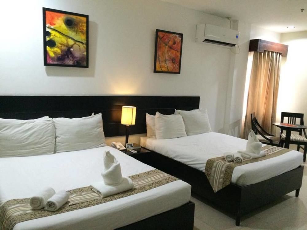 Holiday Suites Puerto Princesa Exterior photo